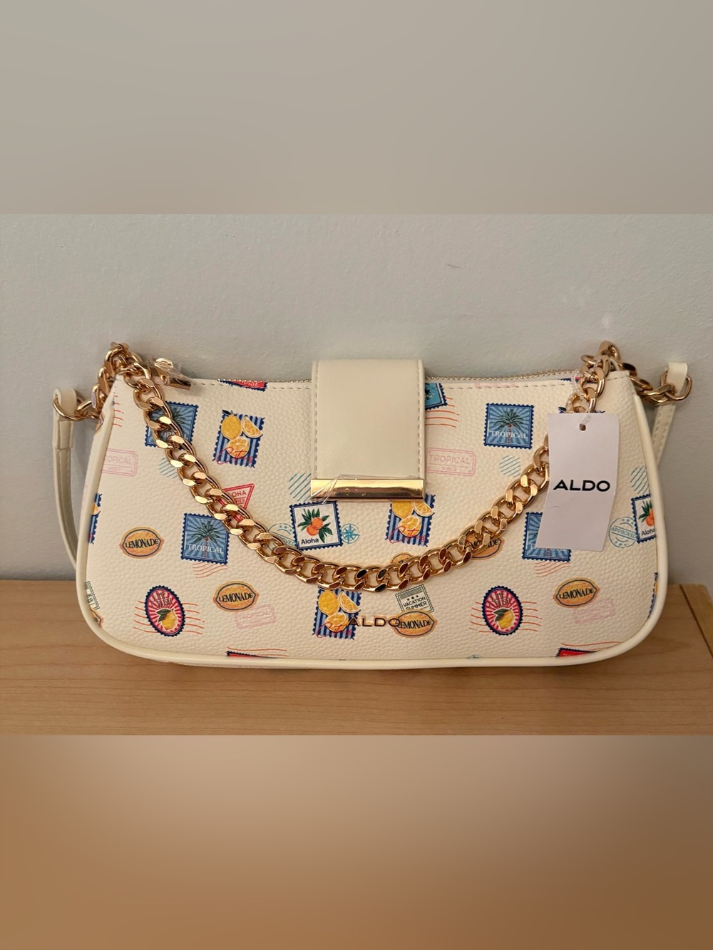 White shoulder bag from Aldo tropical-themed stamp print w/ gold accent chain